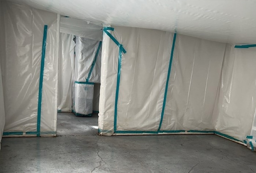 reliance building services asbestos abatement room